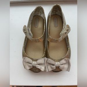 Mini Melissa Gold Bow Shoes